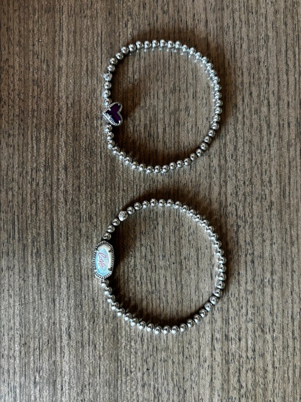 Two Kendra Scott stretch bracelets
